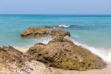 Sandy beach with boulders