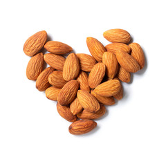 Almond arranged in a heart shape On a white background