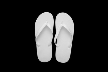 Blank white flip flops on a black cutted background. Mock-up.