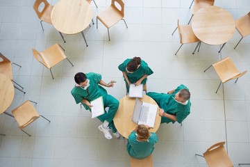 Physicians In Meeting At Cafeteria