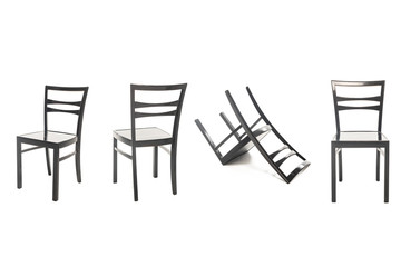 Modern black wooden chairs isolated on white