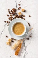 Morning coffee with sugar in white cup