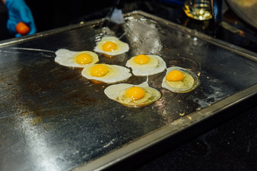Fried and boiled eggs omelet breakfast in the kitchen
