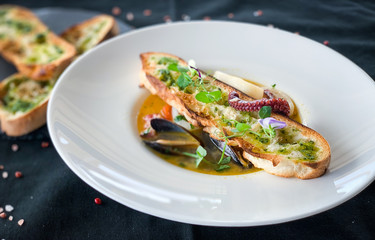 tasty seafood soup & grilled home made bread with spices