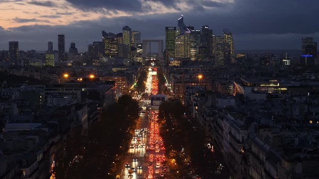 Dramatic sky over business district in Paris, France at night. Arial view.