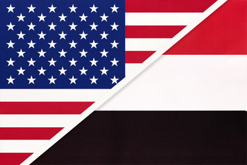 USA vs Yemen national flag from textile. Relationship between two american and asian countries.