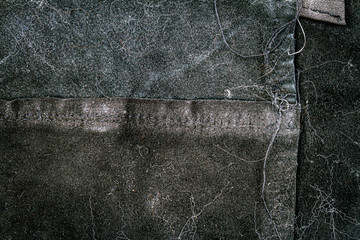 Black grungy leather texture background, back side