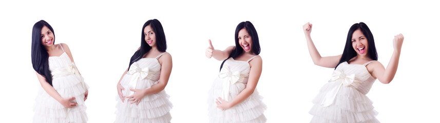 Pregnant woman in wedding dress on white