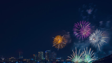 New Year's celebration fireworks in night city in Pattaya, Thailand.