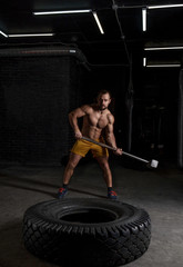 Plakat Strong weightlifter with muscular body prepares to lift the barbell