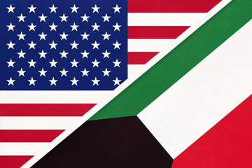 USA vs Kuwait national flag from textile. Relationship between two american and asian countries.