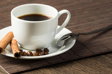 Cup of espresso coffee on wooden table