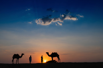 Fototapeta na wymiar Camel ride at Thar desert, Rajasthan, India