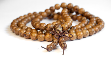 Selective focus beads made of wood.