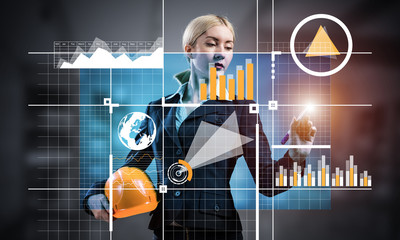 Businesswoman pointing on 3d financial chart