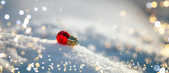 Christmas ball on snow.