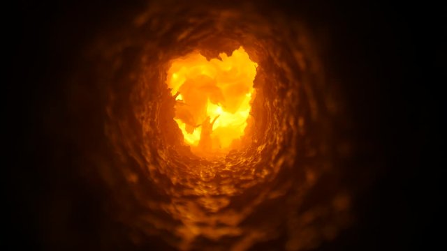 The light at the end of the tunnel. Travelling down a dark cavern towards a bright light.