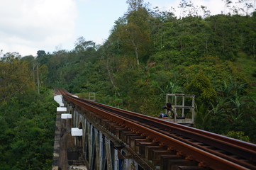 Fototapeta na wymiar Railroad is a means of transportation for trains that are built on bridges using iron and a solid concrete frame