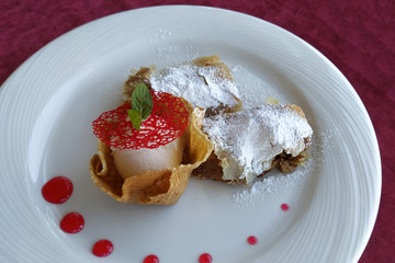 ice cream. strudel and ice cream scoop in a waffle basket