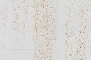Light yellow faded. Texture of stained metal surface with cracked paint with cracked paint.
