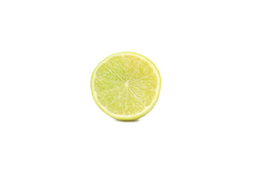Half of lime isolated on white background. Juicy fruits