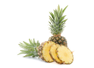 Pineapple and slices isolated on white background