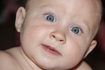 portrait of a baby with blue eyes