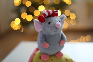 Little mouse toy, symbol of 2020. new year decoration. New Year 2020 Symbol. Greeting Christmas card.  Selective focus.