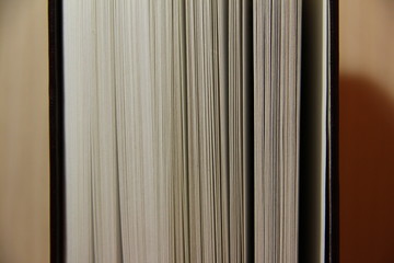 Obraz premium the pages of a thick book from the near