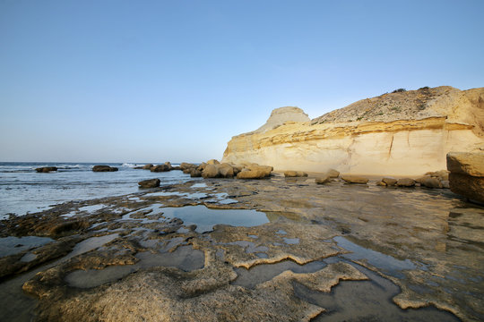 Beautiful cliffs near the city of Zebbug in Xwejni Bay, called Qolla L-Baida. Gozo Island, Malta