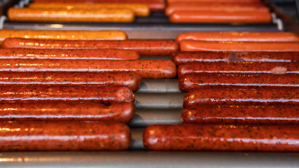 Close-up of grilling sausages for hot dog, outdoors.