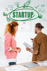 back view of two friends talking and doing paperwork in office with startup illustration