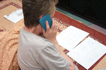 Woman calculating expenses
