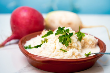 Grated radish porridge with parsley