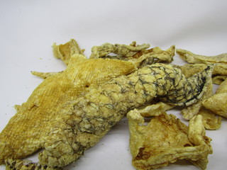 Close up view of kripik krupuk kulit ikan kakap or dried fried red Snapper fish skin scale...
