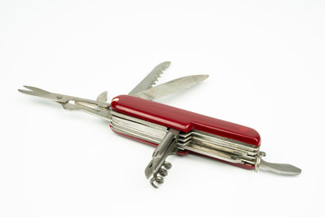 Close up of Swiss style multipurpose knife, isolated on white background