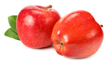 two red apples with green leaves isolated on white background