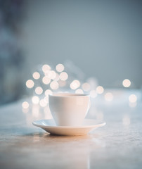 Cup of hot chocolate with christmas decorations on the rustic background. Selective focus. Shallow depth of field.