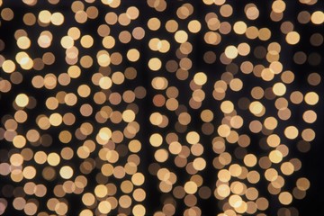 Abstract blur circle golden bokeh  lights  background  of Christmas and Happy New Year