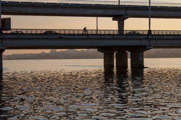 Two-tiered bridge in the city of Voronezh in the evening