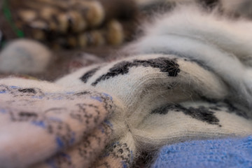 knitted woolen socks are for sale at the Christmas market in Moscow
