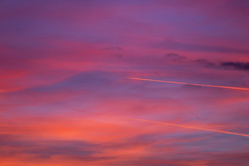Colorful sky cloud textures with chem trails during sunset in Zagreb, Croatia