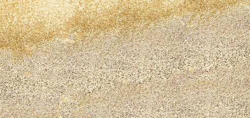 Golden glitter background for Christmas, new year, birthday, special occasions, with a copy space, close-up.