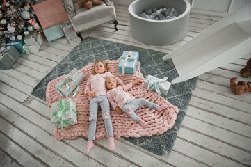 A young family is resting at home during the new year holidays 2038.