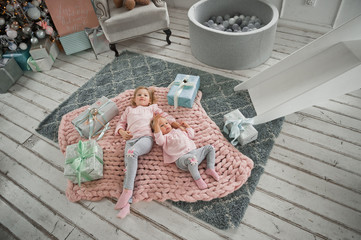 A young family is resting at home during the new year holidays 2040.