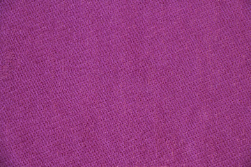Colorful pink natural nepalese pashmina fabric. Herringbone tweed, Virgin Wool Background Texture. Expensive material. High resolution. Pashmina is a fine type of cashmere wool.