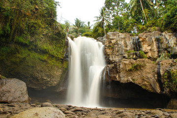 Naklejka na ściany i meble A giant waterfall next to the village of Ubud in Bali
