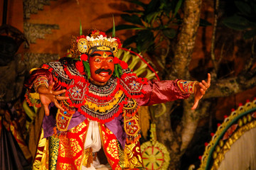 Ubud, Bali / Indonesia »; August 2017: A figure of legend dancer dancing Balinese dances with a red mask