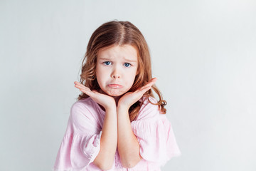 Portrait of beautiful fashionable little girl posing