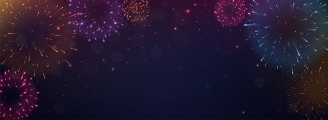 Bright Colorful Fireworks on night background © radenmas